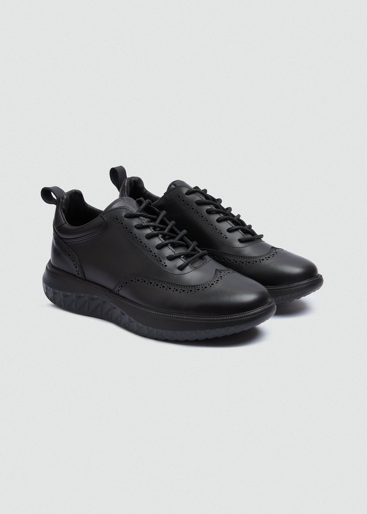 Wingtip Leather Sneaker — Black