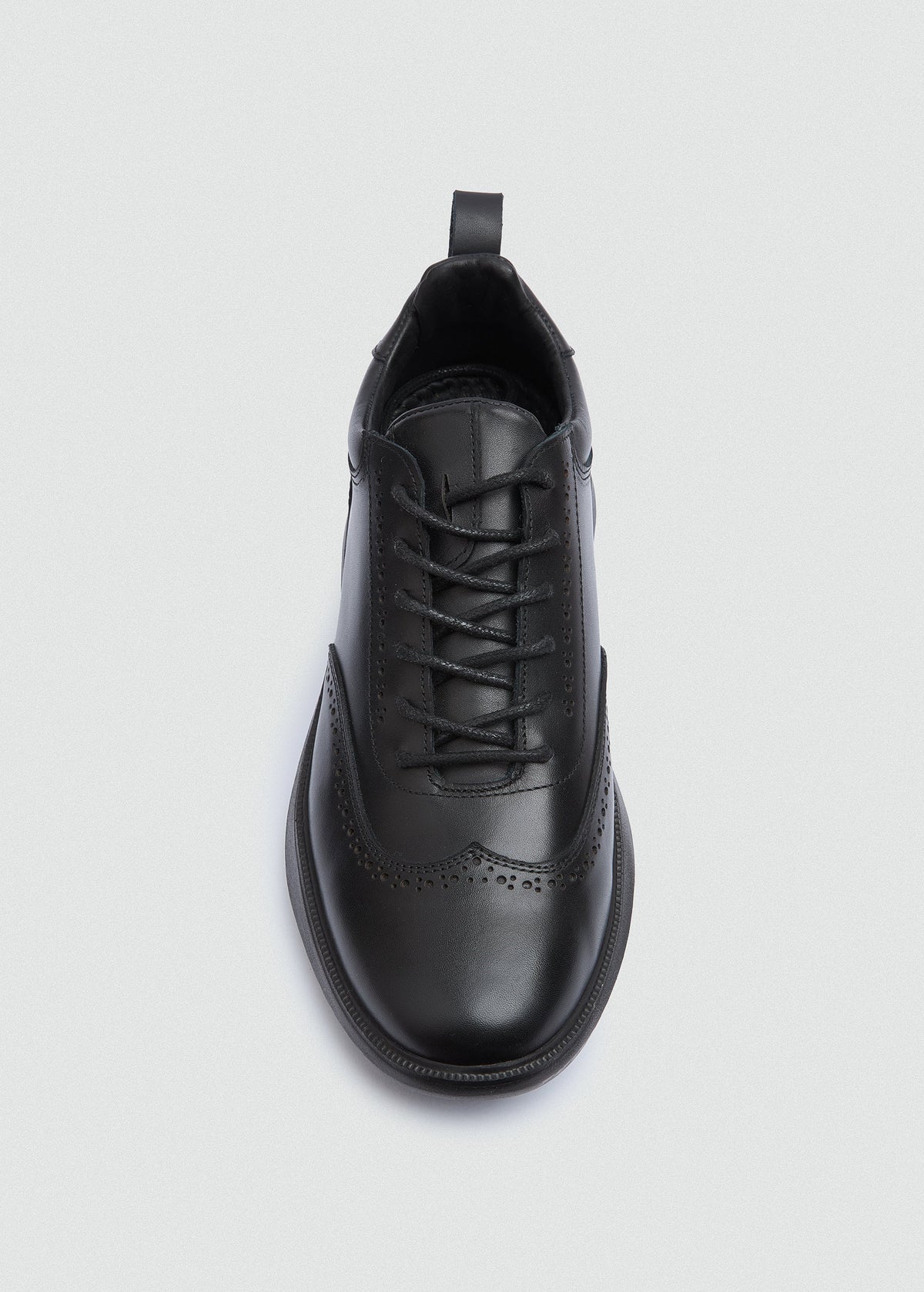 Wingtip Leather Sneaker — Black