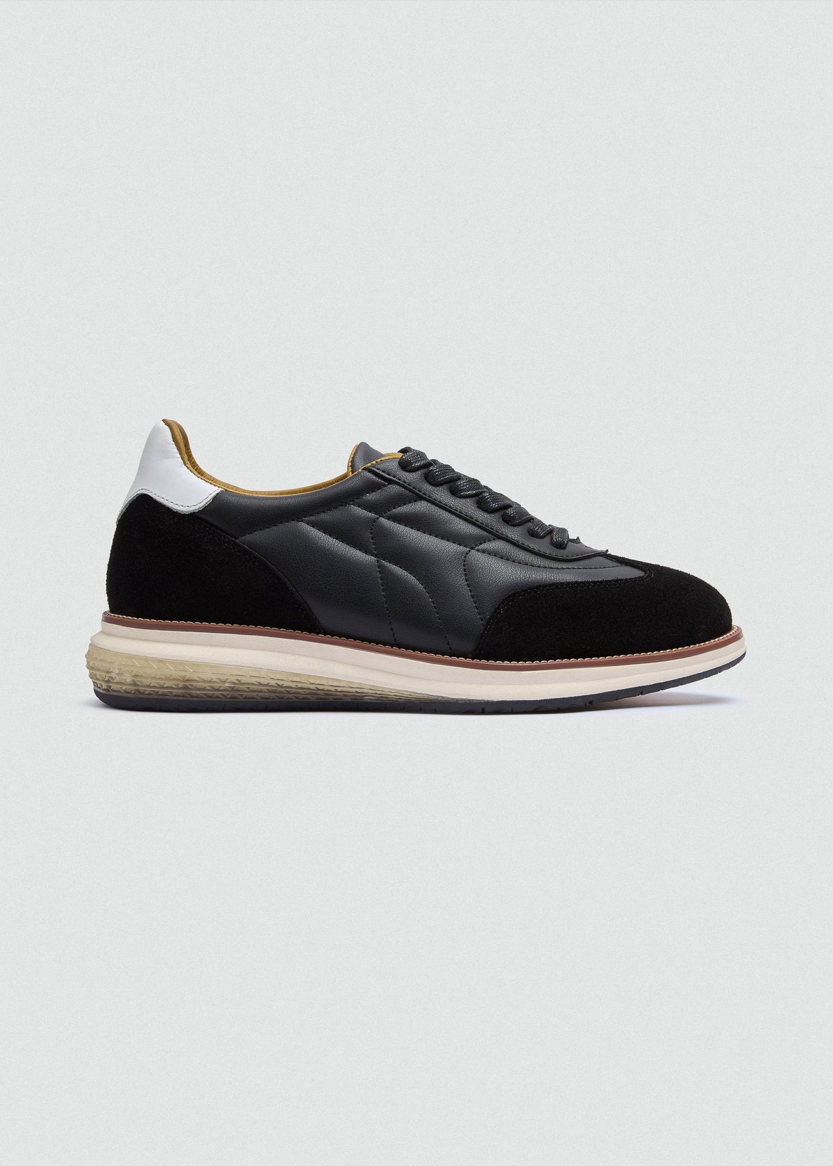 Quilted Leather Sneaker — Black