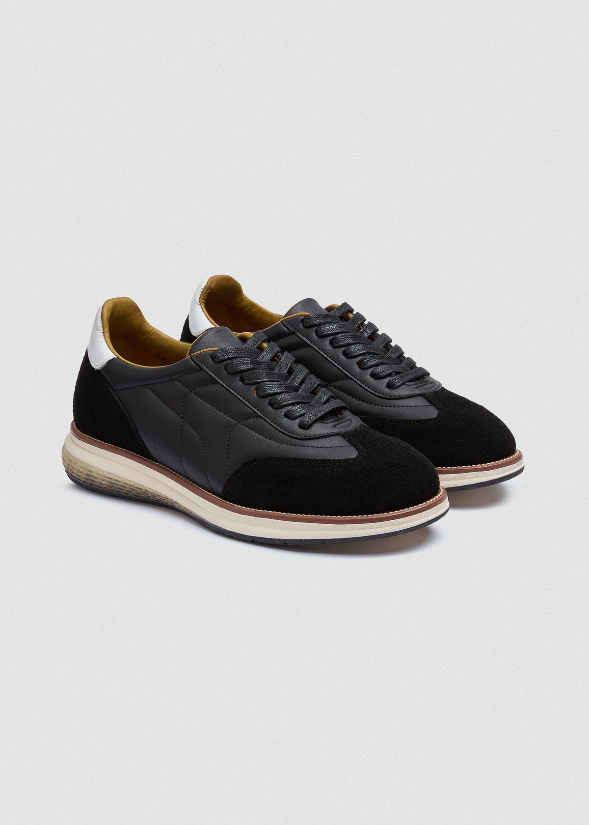 Quilted Leather Sneaker — Black